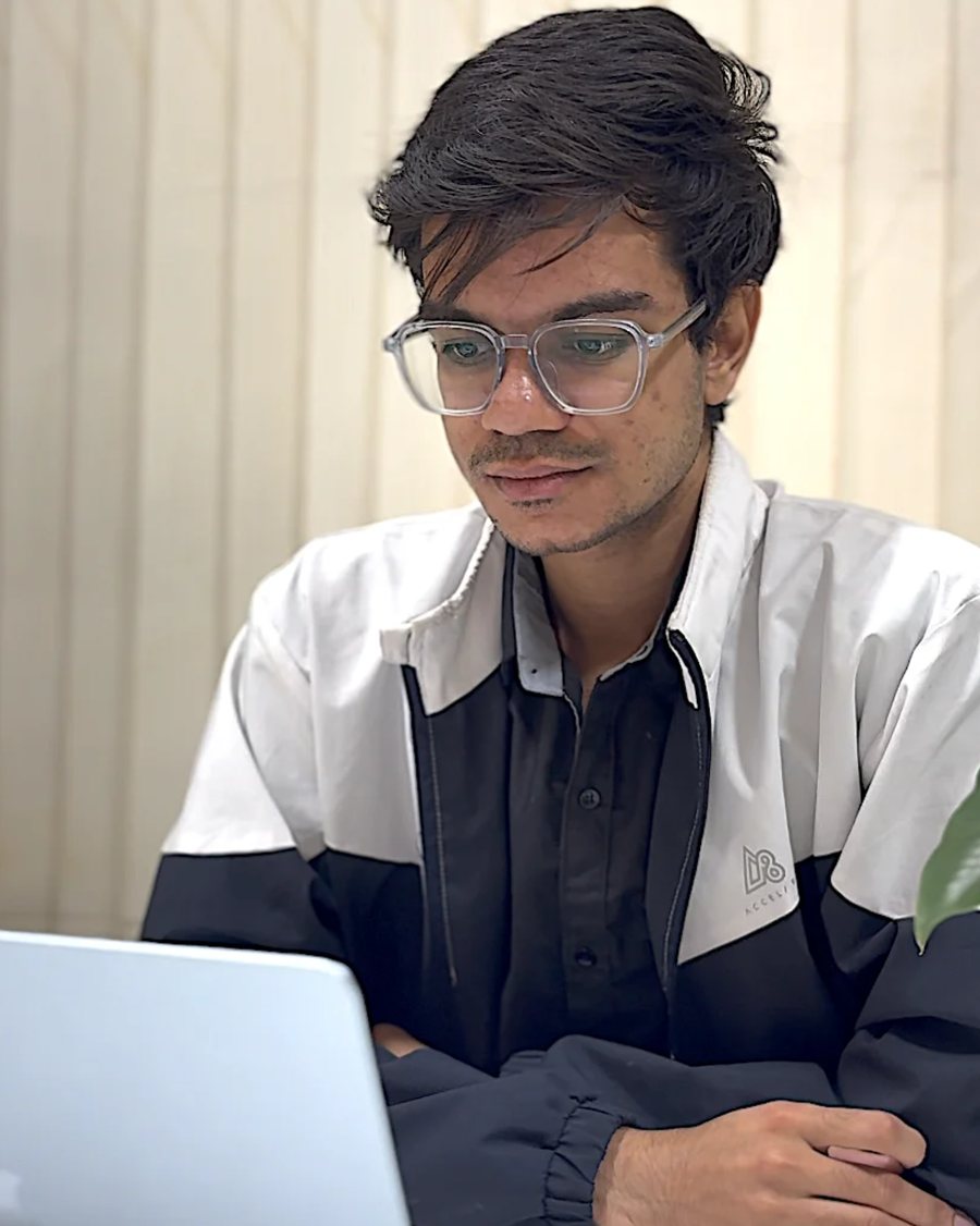 Shubham Panchal working at a laptop